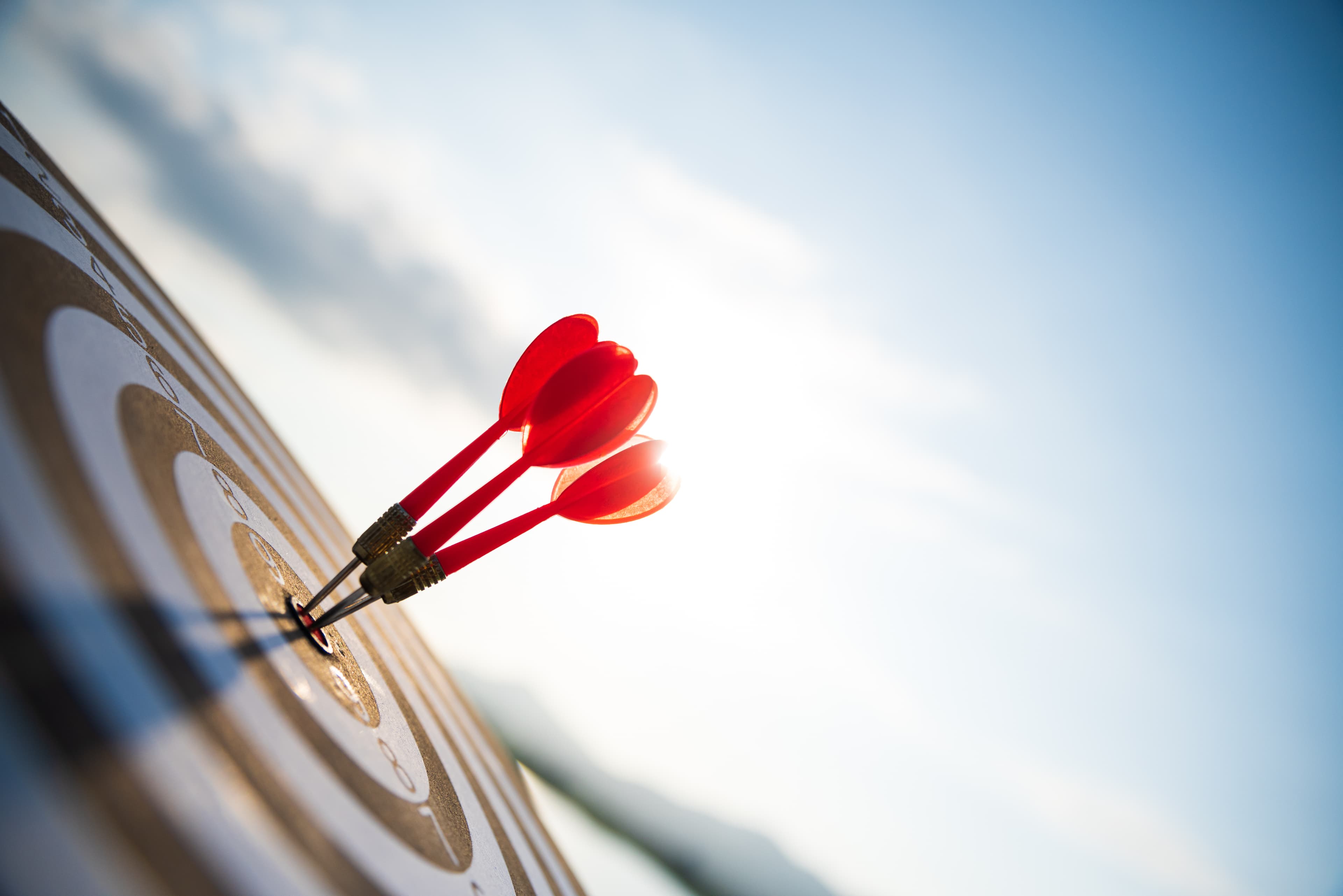 Target with red darts